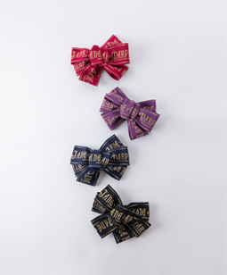 Drape logo ribbon corsage